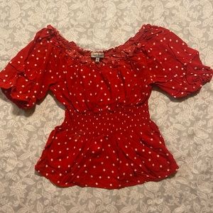 Red poka-dot shirt